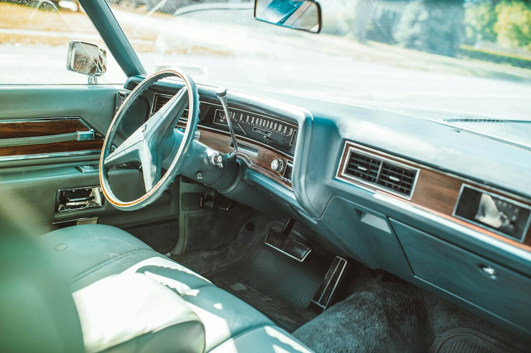 Elegant leather interior and dashboard of a vintage luxury automobile